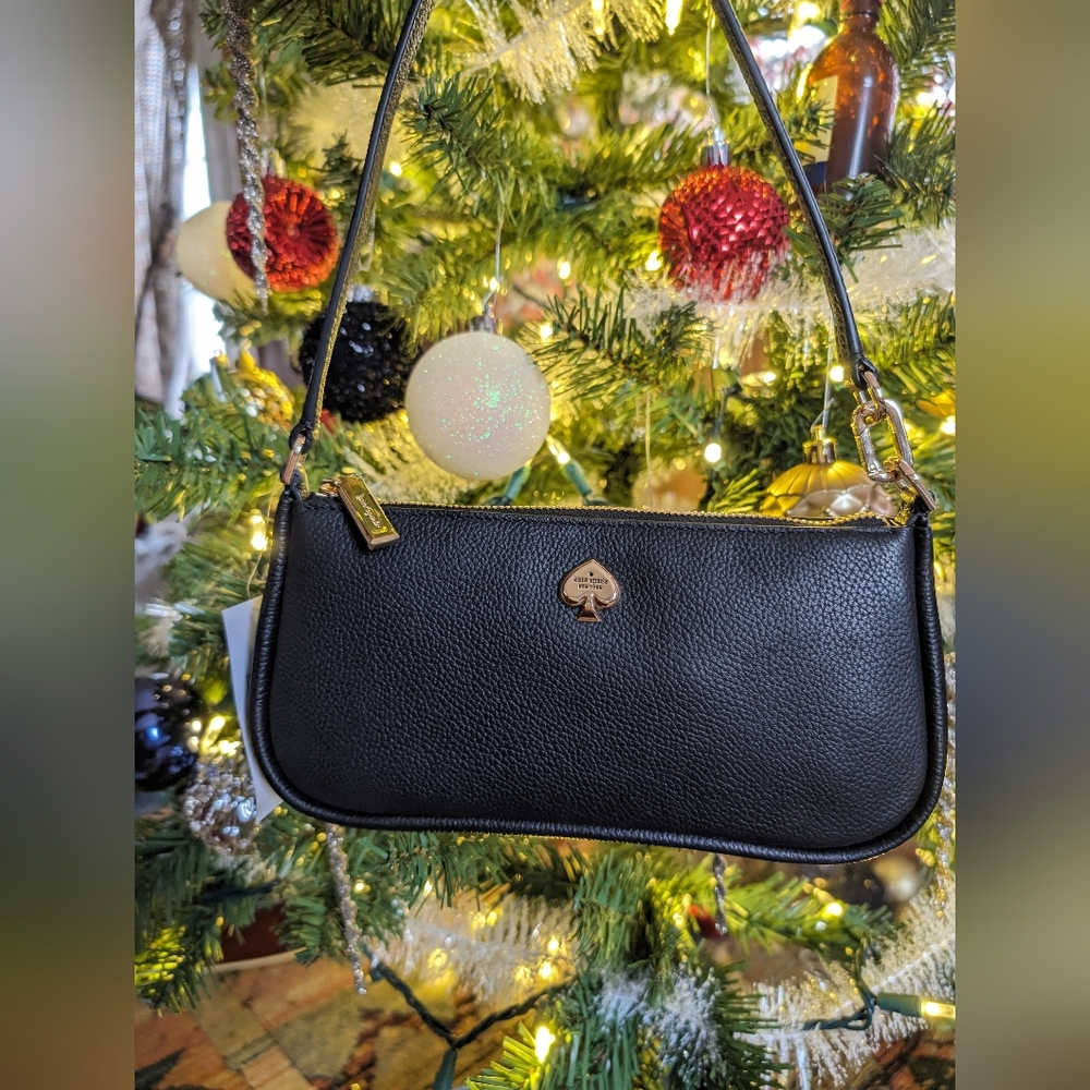 Brand new Kate Spade mini purse with original tags and packaging